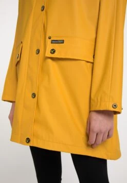 Schmuddelwedda Manteaux De Pluie Manteau Mi-saison Femme Moutarde -Schmuddelwedda 354e62118eae32cbb28747aa232bbbd1